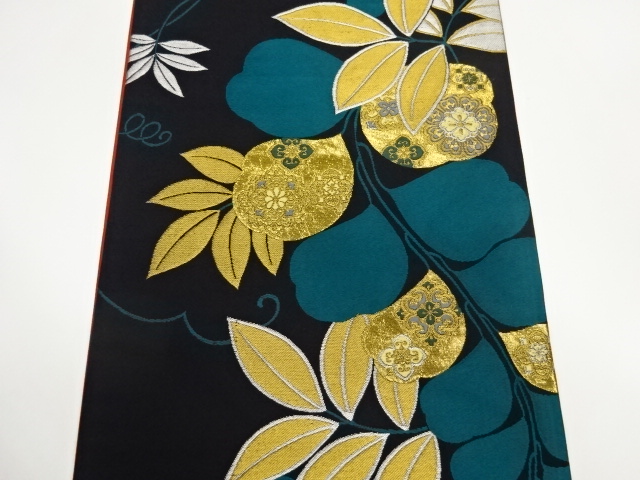  葉に華文模様織出し袋帯